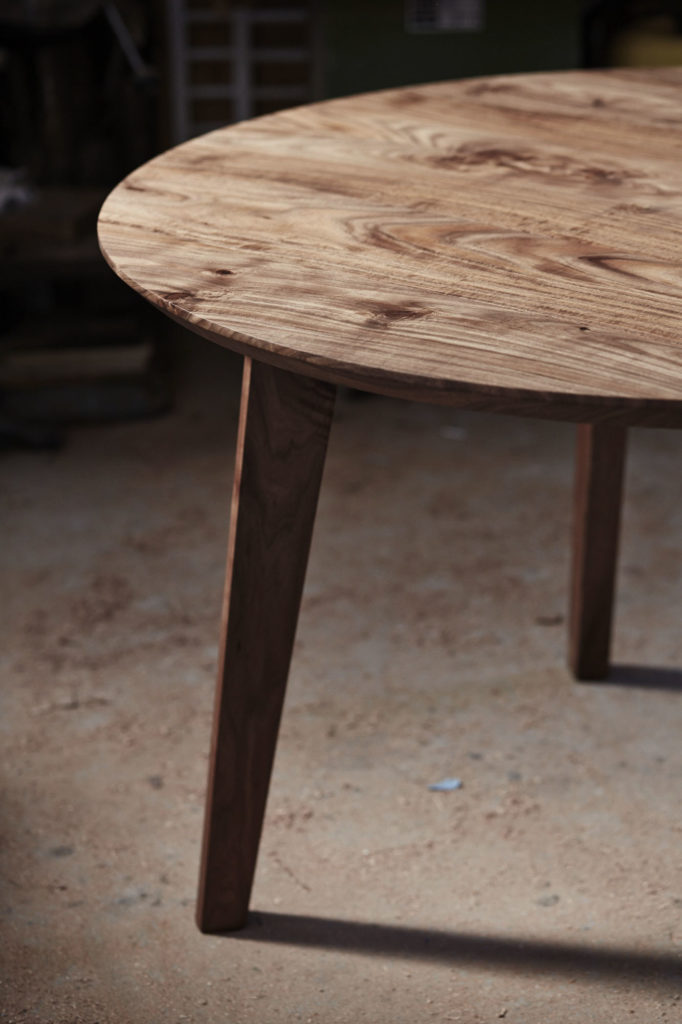 mid-century inspired contemporary circular kitchen table in Australian blackwood with chamfered edge